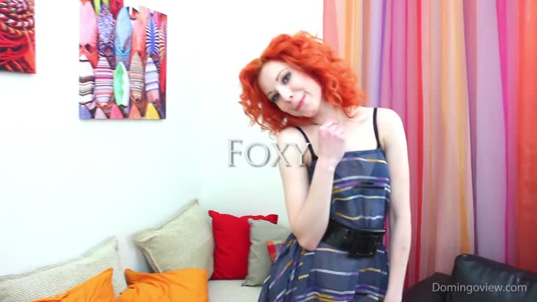 Foxy Redhead Bitch Striptease